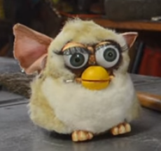 prototype furby. it is extremely skrunkled.